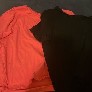 Two t-shirts from target Pink one fits like a Medium Black one is Medium